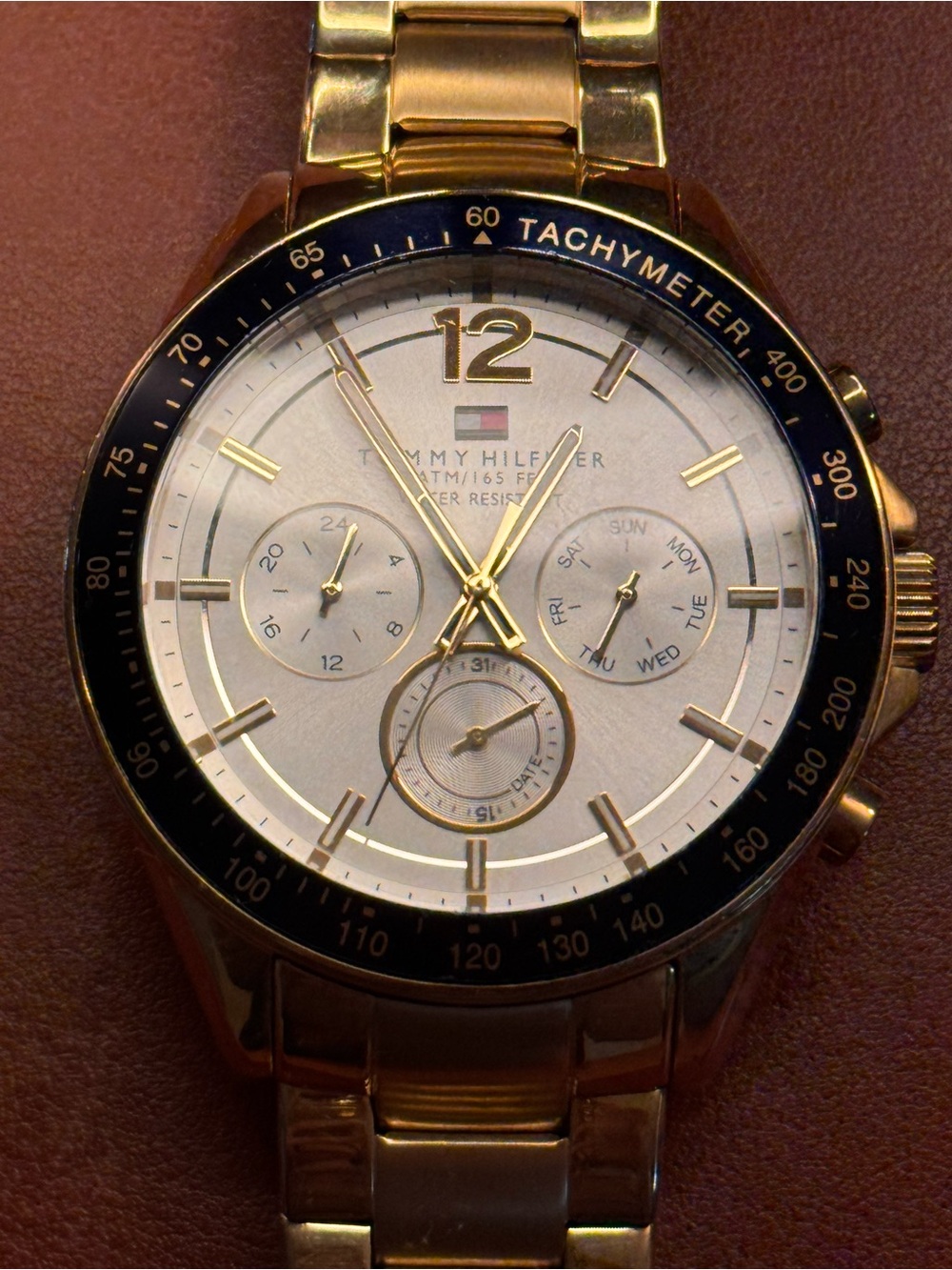 Tommy Hilfiger Gold Tone Watch with White Dial and Dark blue Bezel